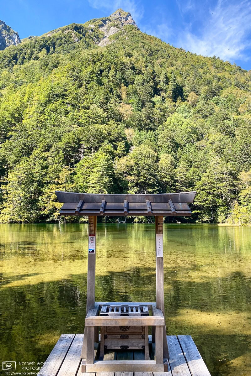 Shrine at Myojin Pond at Kamikochi in Nagano Prefecture, Japan. © 2022 Norbert Woehnl Photography.