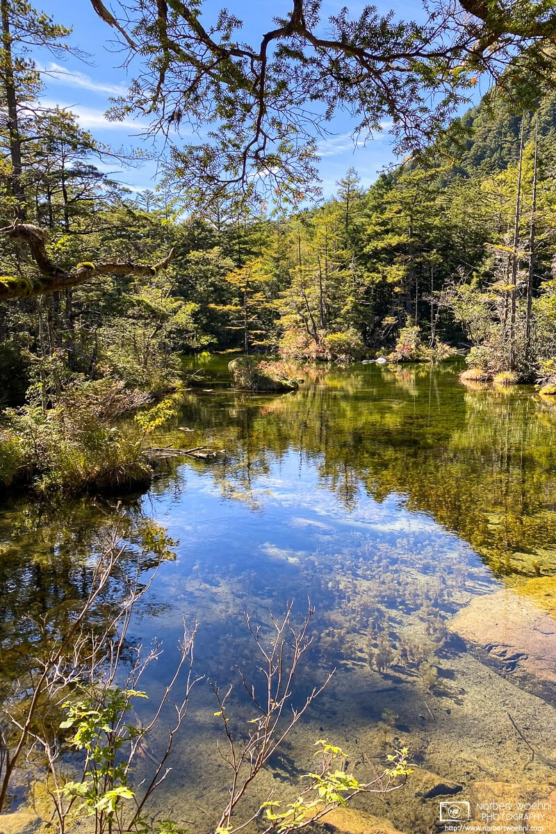 Reflections at Myojin Pond at Kamikochi in Nagano Prefecture, Japan. © 2022 Norbert Woehnl Photography.