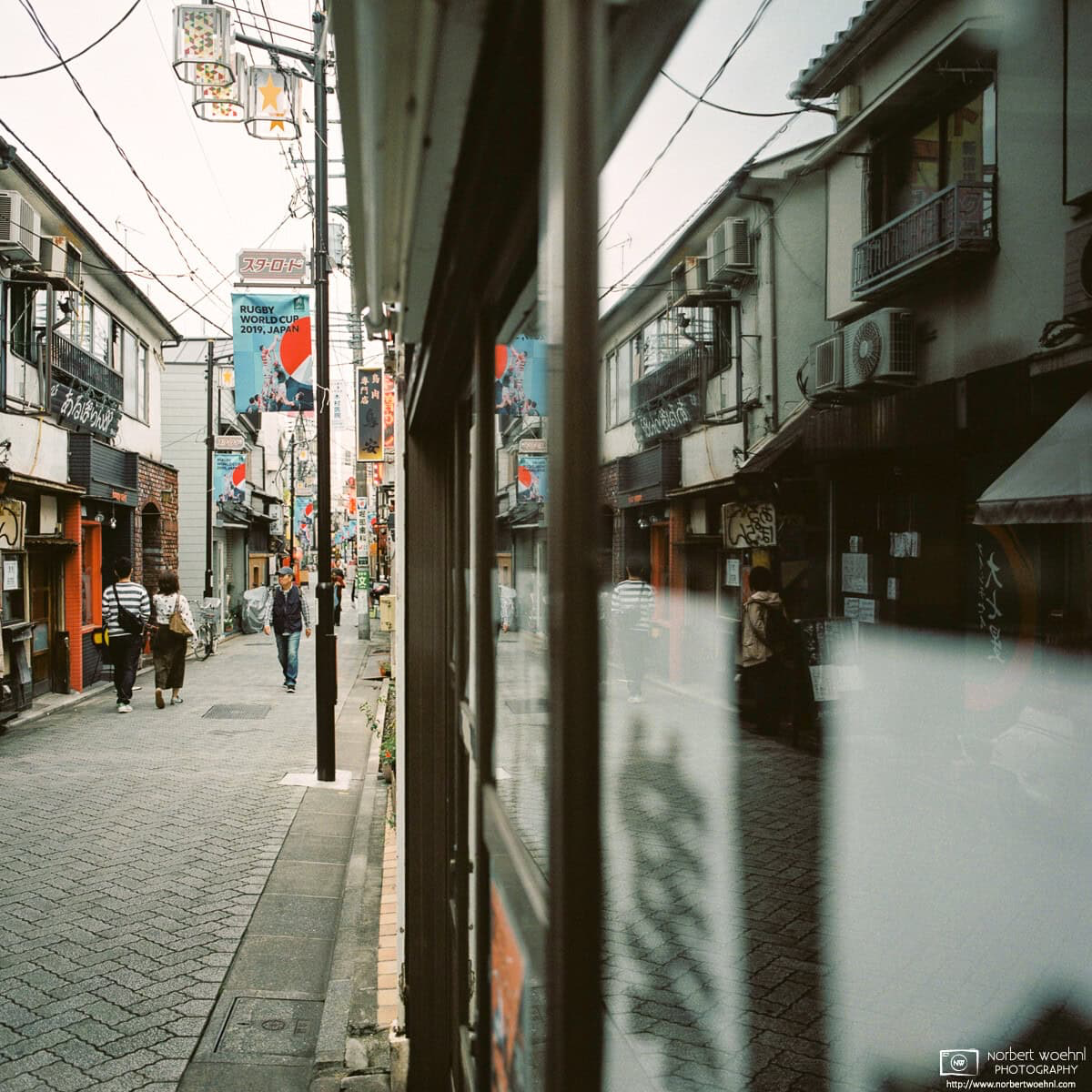 Window reflections on Star Road in Asagaya, Tokyo. © 2019 Norbert Woehnl Photography.