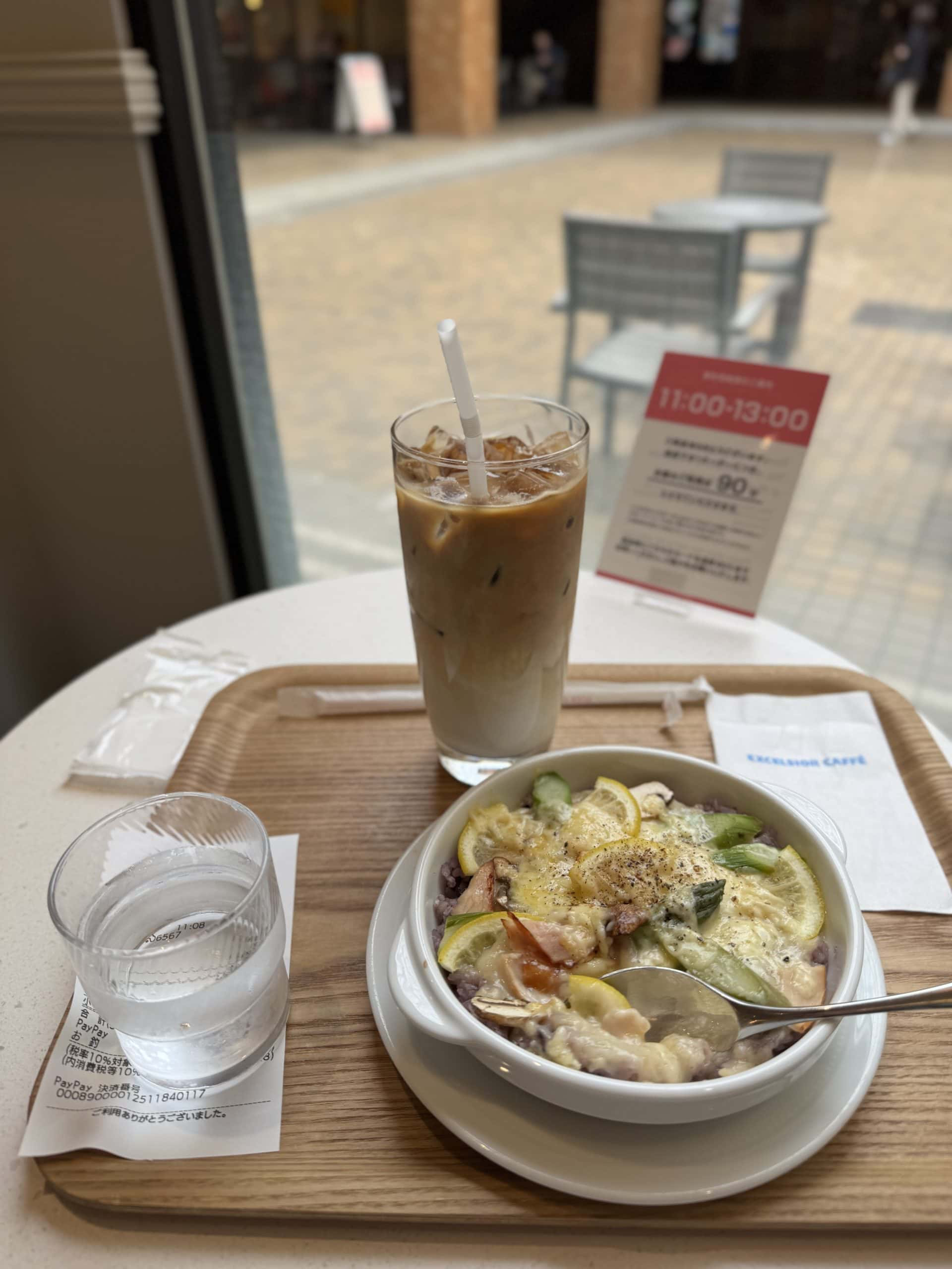 Creamy Doria (a Japanese rice gratin) of Smoked Chicken and Asparagus with Lemon, Ice Caffe Latte. © 2025 Norbert Woehnl Photography.