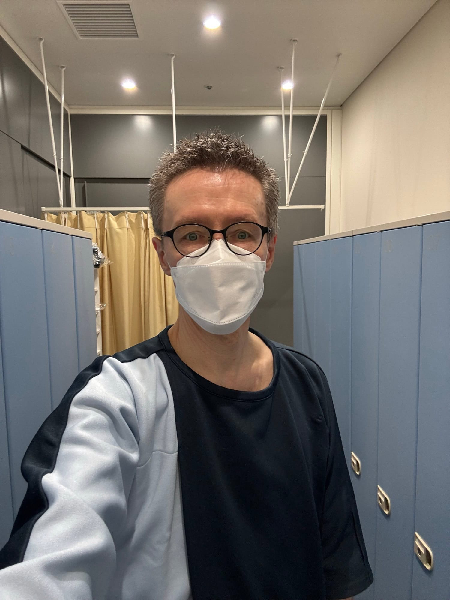 Changed into the hospital gowns and ready for the medical checkup. © 2025 Norbert Woehnl Photography.