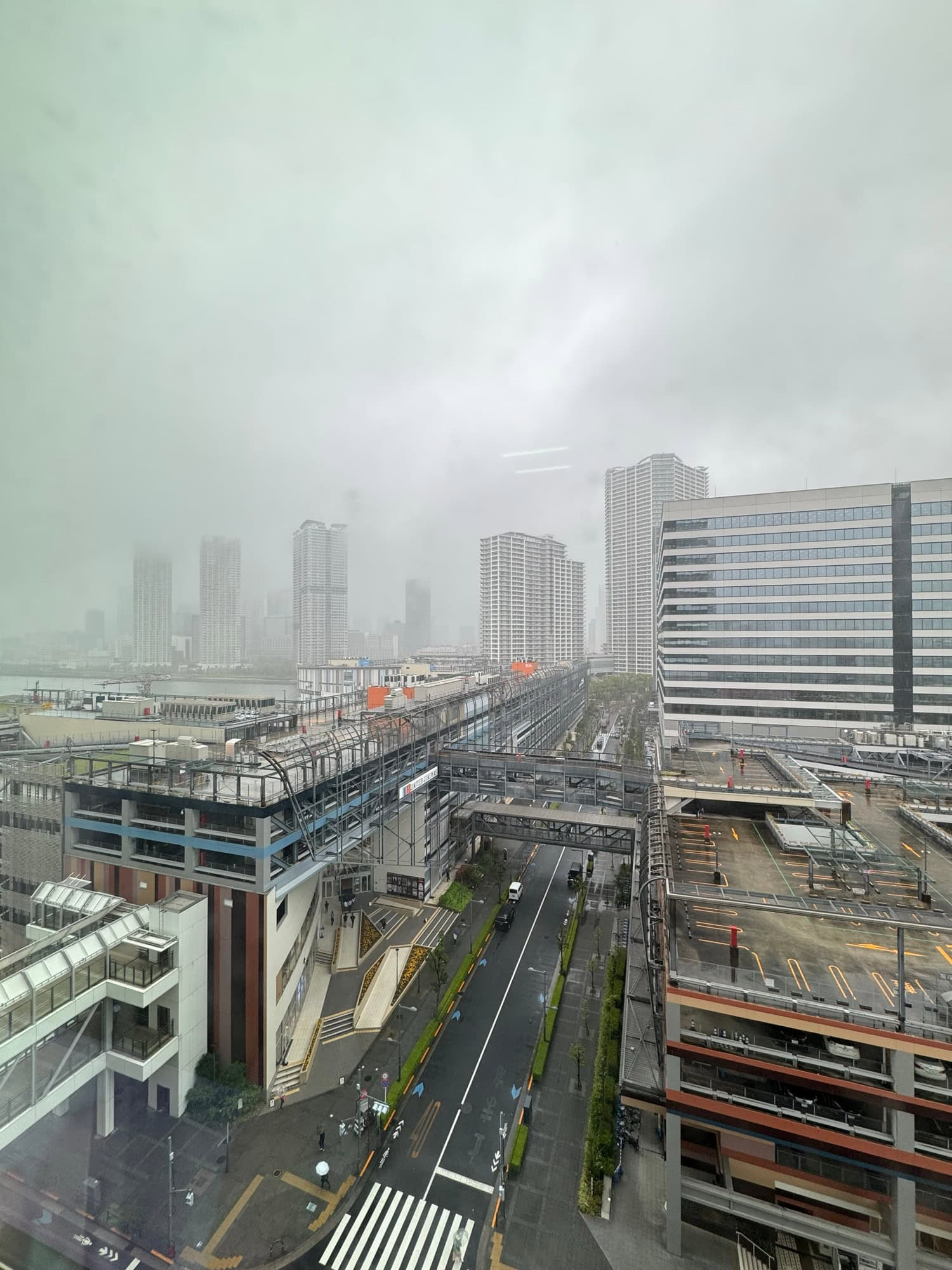 View out of an office window in the Toyosu area of Tokyo, Japan (Rainy Day Version). © 2025 Norbert Woehnl Photography.